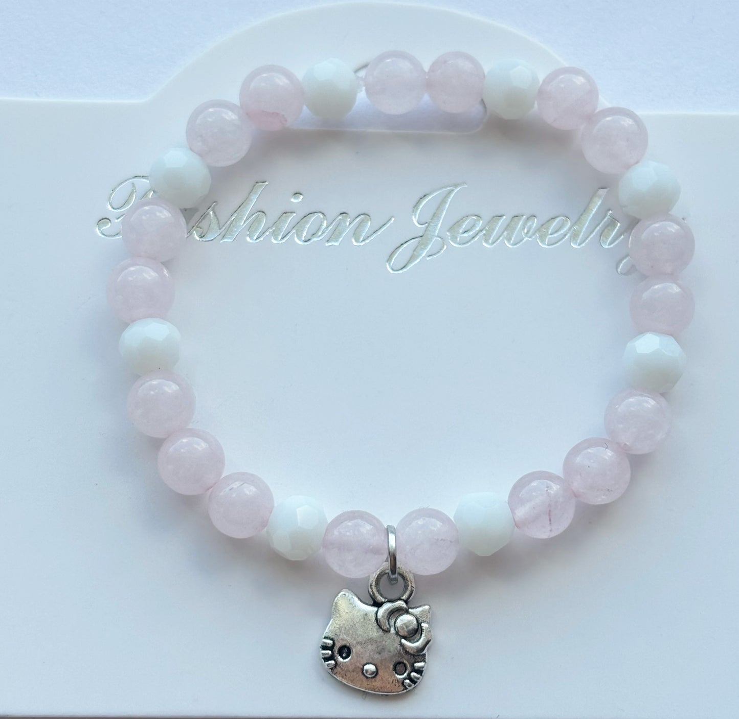 Pink kitty bracelet stack